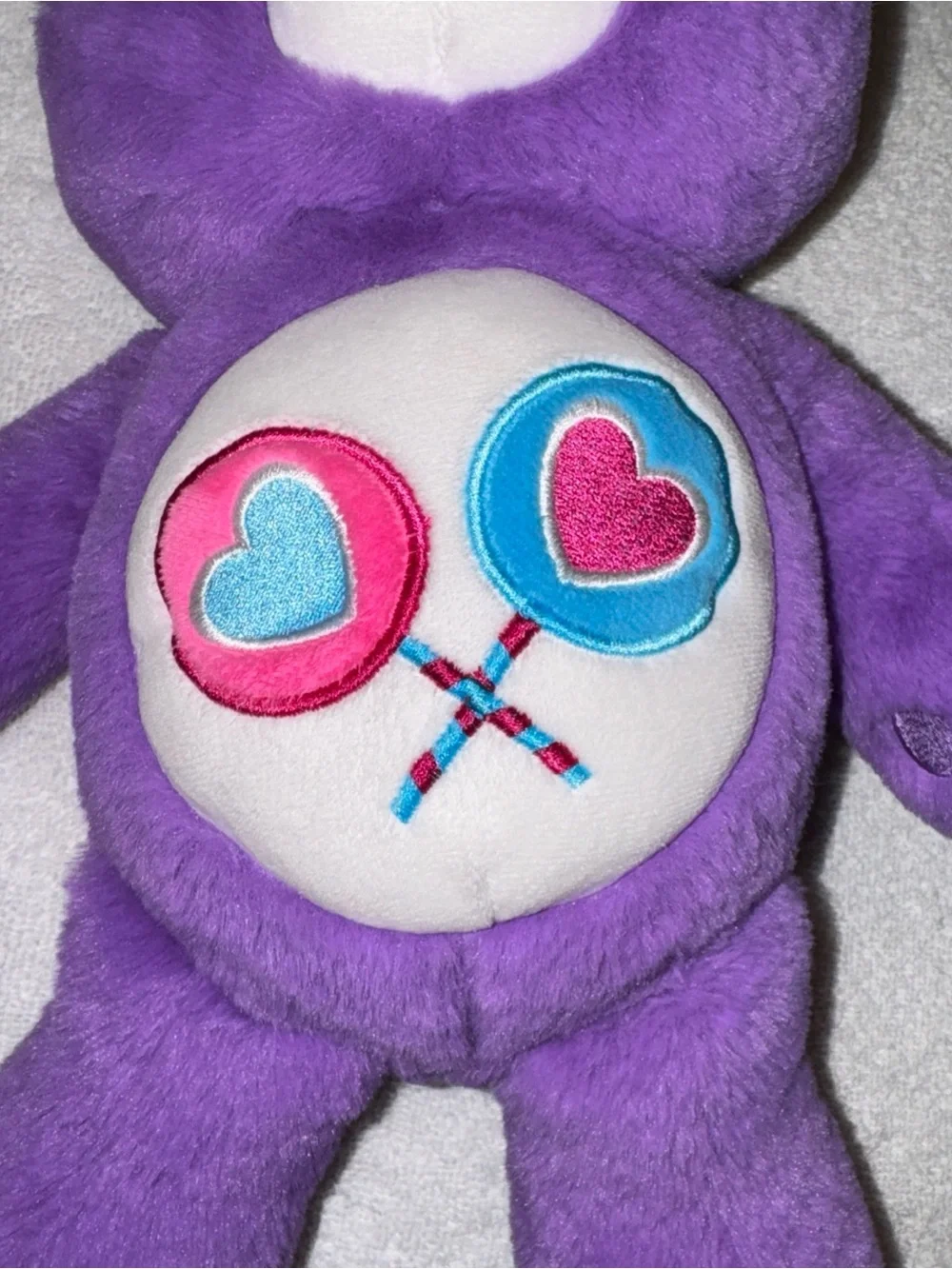 Care Bears Purple Plush with Pink & Blue Heart Lollipop Belly Badge